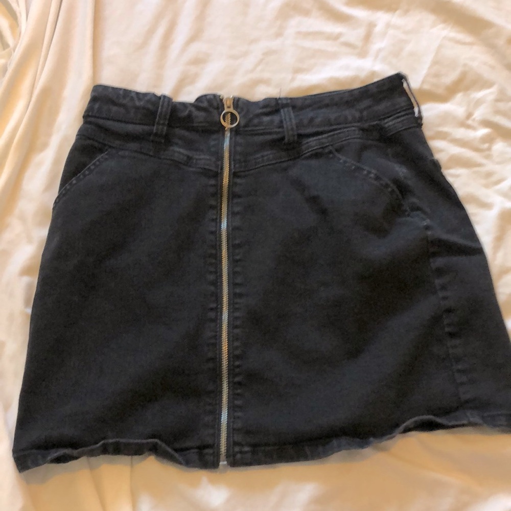 Black jean skirt with golden zipper
